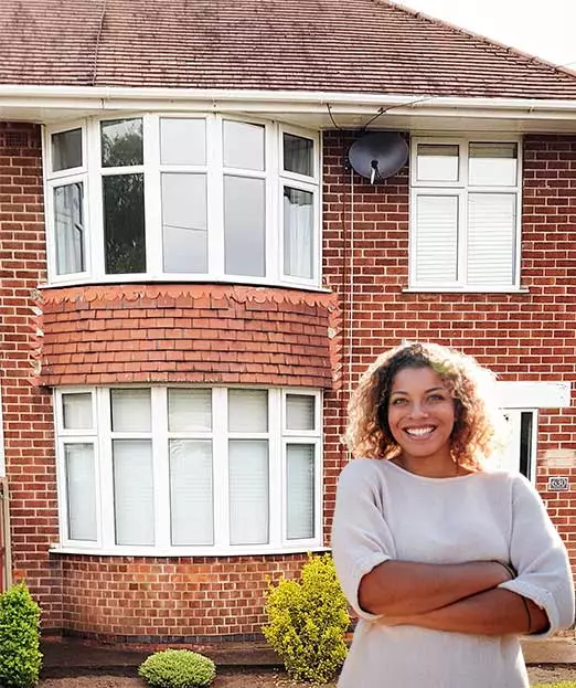 happy woman after window cleaning