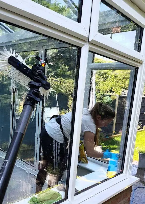 Person washing window